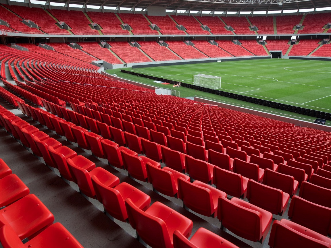 Rows of empty red stadium seats waiting for fans before Panama vs England